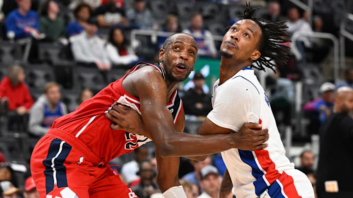 Oct 16, 2025; Detroit, Michigan, USA; Washington Wizards forward Khris Middleton (22) battles for position with Detroit Pistons forward Ronald Holland II (5) on a foul shot in the second quarter at Little Caesars Arena. Mandatory Credit: Lon Horwedel-Imagn Images