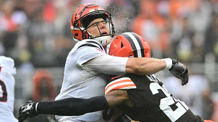 Sep 10, 2023; Cleveland, Ohio, USA; Cleveland Browns safety Grant Delpit (22) hits Cincinnati Bengals quarterback Joe Burrow (9) during the second half at Cleveland Browns Stadium. Mandatory Credit: Ken Blaze-Imagn Images