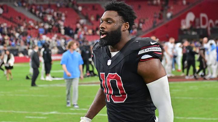 Oct 5, 2025; Glendale, Arizona, USA; Arizona Cardinals outside linebacker Josh Sweat (10) walks off the field at the end of their game against the Tennessee Titans at State Farm Stadium. Mandatory Credit: Matt Kartozian-Imagn Images