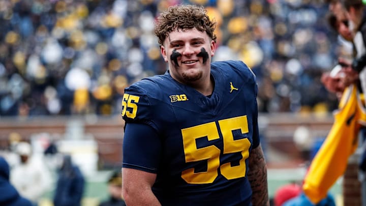 Blue Team defensive lineman Mason Graham (55) walks up the tunnel for halftime during the spring game at Michigan Stadium in Ann Arbor on Saturday, April 20, 2024. Blue Team defensive lineman Mason Graham (55) walks up the tunnel for halftime during the spring game at Michigan Stadium in Ann Arbor on Saturday, April 20, 2024.