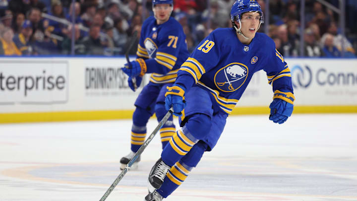 Mar 27, 2024; Buffalo, New York, USA;  Buffalo Sabres center Peyton Krebs (19) looks for the puck during the third period against the Ottawa Senators at KeyBank Center. Mandatory Credit: Timothy T. Ludwig-Imagn Images