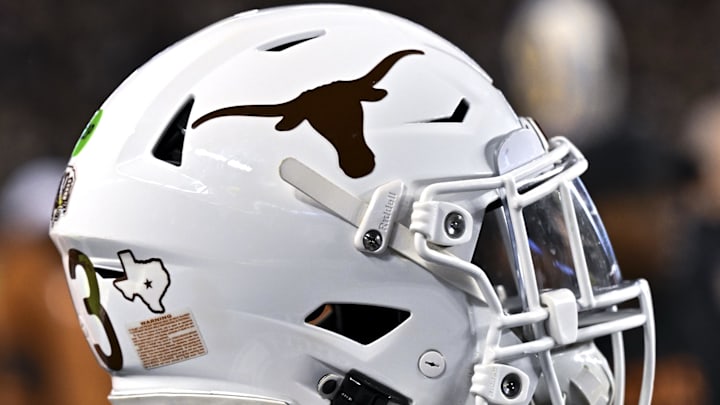 Nov 30, 2024; College Station, Texas, USA; A detail view of a Texas Longhorns helmet on the sideline during the first quarter against the Texas A&M Aggies. The Longhorns defeated the Aggies 17-7 at Kyle Field. Mandatory Credit: Maria Lysaker-Imagn Images  