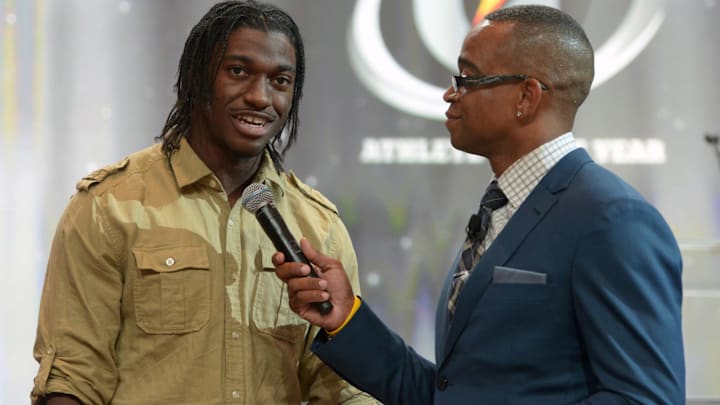 ESPN SportsCenter anchor Stuart Scott (right) interviews Washington Redskins quarterback Robert Griffin III at the 2012 Gatorade National Athlete of the Year awards ceremony at the Loews Hollywood Hotel. ESPN SportsCenter anchor Stuart Scott (right) interviews Washington Redskins quarterback Robert Griffin III at the 2012 Gatorade National Athlete of the Year awards ceremony at the Loews Hollywood Hotel.