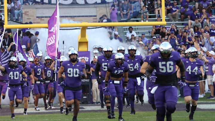 The TCU Horned Frogs take the field prior to the October 4 game against Houston. The TCU Horned Frogs take the field prior to the October 4 game against Houston.