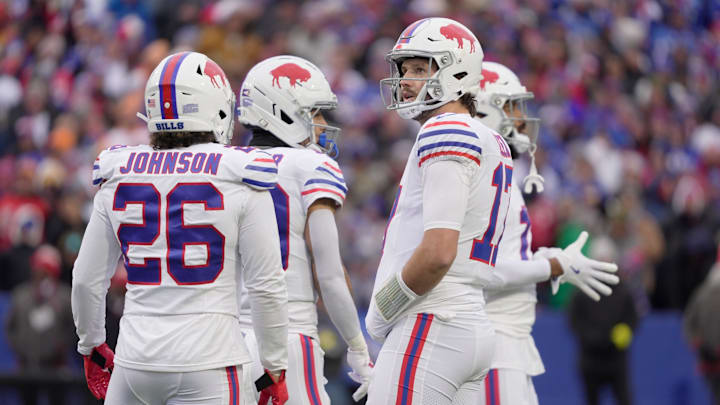 Josh Allen (center right) saw his NFL MVP odds drop after a bad game against the Texans. 