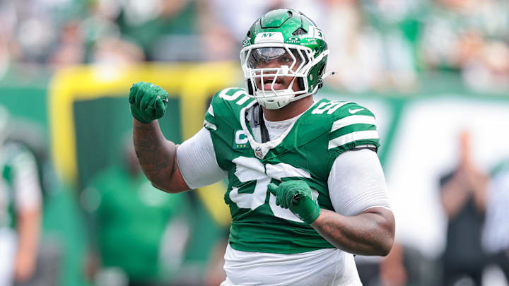 Sep 7, 2025; East Rutherford, New Jersey, USA; New York Jets defensive tackle Quinnen Williams (95) celebrates after a defensive stop during the game against the Pittsburgh Steelers at MetLife Stadium. Mandatory Credit: Vincent Carchietta-Imagn Images