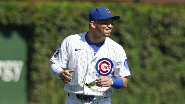 Chicago Cubs right fielder Seiya Suzuki (27) warms up before a baseball game against the St. Louis Cardinals at Wrigley Field. Chicago Cubs right fielder Seiya Suzuki (27) warms up before a baseball game against the St. Louis Cardinals at Wrigley Field.