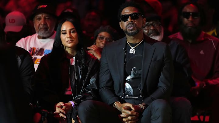 Jan 19, 2024; Miami, Florida, USA; Former Miami Heat player Udonis Haslem sits on the court for his jersey retirement ceremony during halftime of the game between the Miami Heat and the Atlanta Hawks Kaseya Center. Mandatory Credit: Jasen Vinlove-Imagn Images Jan 19, 2024; Miami, Florida, USA; Former Miami Heat player Udonis Haslem sits on the court for his jersey retirement ceremony during halftime of the game between the Miami Heat and the Atlanta Hawks Kaseya Center. Mandatory Credit: Jasen Vinlove-Imagn Images