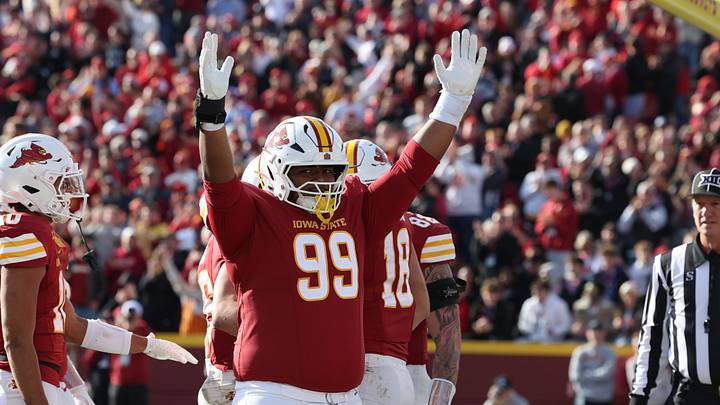 Nov 22, 2025; Ames, Iowa, USA; Iowa State Cyclones defensive lineman Cannon Butler (99) celebrates a Cyclones touchdown against the Kansas Jayhawks during the second half at Jack Trice Stadium. Mandatory Credit: Reese Strickland-Imagn Images
