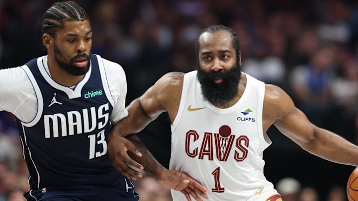 Mar 13, 2026; Dallas, Texas, USA; Cleveland Cavaliers guard James Harden (1) dribbles as Dallas Mavericks forward Naji Marshall (13) defends during the first half at American Airlines Center. Mandatory Credit: Kevin Jairaj-Imagn Images Mar 13, 2026; Dallas, Texas, USA; Cleveland Cavaliers guard James Harden (1) dribbles as Dallas Mavericks forward Naji Marshall (13) defends during the first half at American Airlines Center. Mandatory Credit: Kevin Jairaj-Imagn Images
