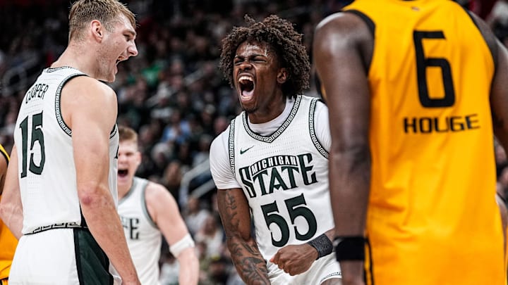 Michigan State forward Coen Carr (55) celebrates a play against Oakland during the second half at Little Caesars Arena in Detroit on Saturday, Dec. 20, 2025.