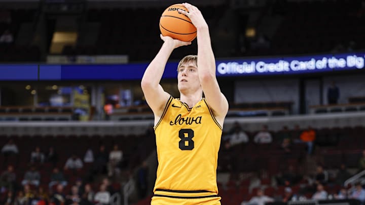 Mar 11, 2026; Chicago, IL, USA; Iowa Hawkeyes forward Cooper Koch (8) shoots against the Iowa Hawkeyes during the second half at United Center. Mandatory Credit: Kamil Krzaczynski-Imagn Images