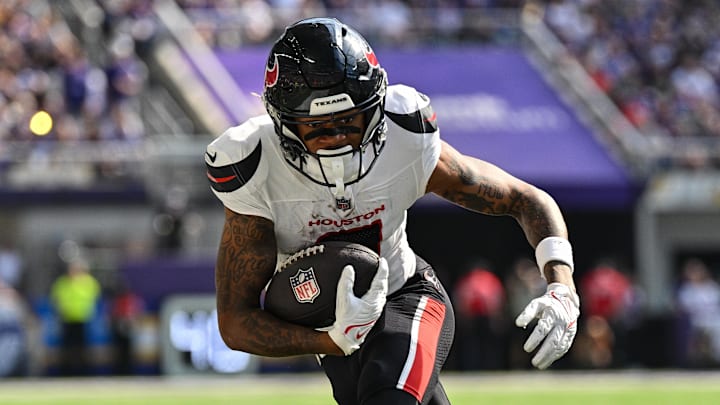 Sep 22, 2024; Minneapolis, Minnesota, USA; Houston Texans wide receiver Tank Dell (3) runs the ball against the Minnesota Vikings during the third quarter at U.S. Bank Stadium. Mandatory Credit: Jeffrey Becker-Imagn Images