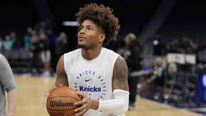 Mar 20, 2025; Charlotte, North Carolina, USA; New York Knicks guard Miles McBride (2) during pregame warmups against the Charlotte Hornets at Spectrum Center. Mandatory Credit: Jim Dedmon-Imagn Images