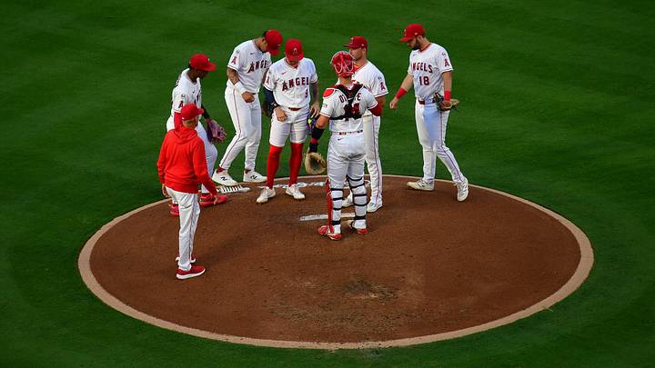 Angels pitching coach Mike Maddux (88) third baseman Denzer Guzman (23) second baseman Vaughn Grissom (5) shortstop Zach Neto (9) first baseman Nolan Schanuel (18) meet with pitcher Reid Detmers (48) and catcher Logan O'Hoppe (14) during the third inning at Angel Stadium on July 3. Angels pitching coach Mike Maddux (88) third baseman Denzer Guzman (23) second baseman Vaughn Grissom (5) shortstop Zach Neto (9) first baseman Nolan Schanuel (18) meet with pitcher Reid Detmers (48) and catcher Logan O'Hoppe (14) during the third inning at Angel Stadium on July 3.