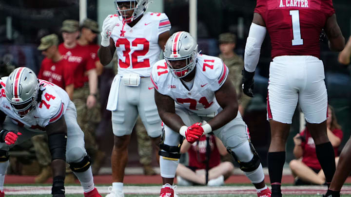 Sep 2, 2023; Bloomington, Indiana, USA; Ohio State Buckeyes offensive lineman Josh Simmons (71) lines up during the NCAA football game at Indiana University Memorial Stadium. Ohio State won 23-3. Sep 2, 2023; Bloomington, Indiana, USA; Ohio State Buckeyes offensive lineman Josh Simmons (71) lines up during the NCAA football game at Indiana University Memorial Stadium. Ohio State won 23-3.
