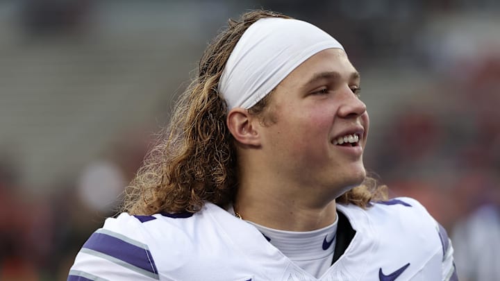 Nov 2, 2024; Houston, Texas, USA; Kansas State Wildcats quarterback Avery Johnson (2) walks off the field to the locker room before a game against the Houston Cougars at TDECU Stadium. Mandatory Credit: Thomas B. Shea-Imagn Images