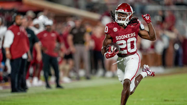 Oklahoma running back Sam Franklin runs the ball for a first down in the second half against Temple. 