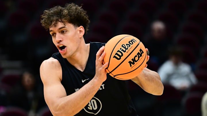 Mar 20, 2025; Cleveland, OH, USA; Vanderbilt Commodores guard Chris Manon (30) drives to the basket during practice at Rocket Arena. Mandatory Credit: Ken Blaze-Imagn Images
