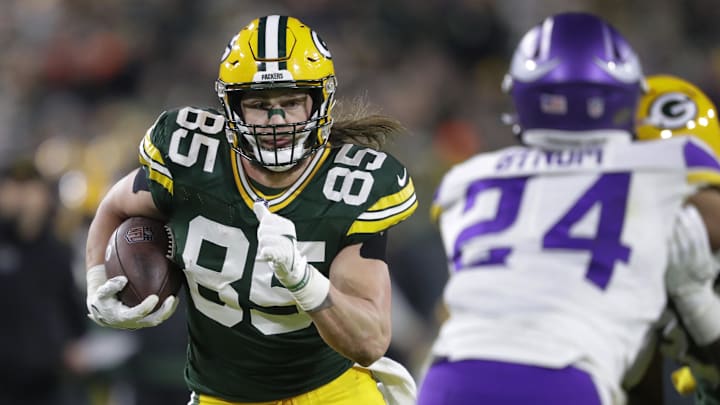 Jan 1, 2023; Green Bay, Wisconsin, USA; Green Bay Packers tight end Robert Tonyan (85) runs for a first down on a reception against the Minnesota Vikings in the fourth quarter of their game at Lambeau Field.
