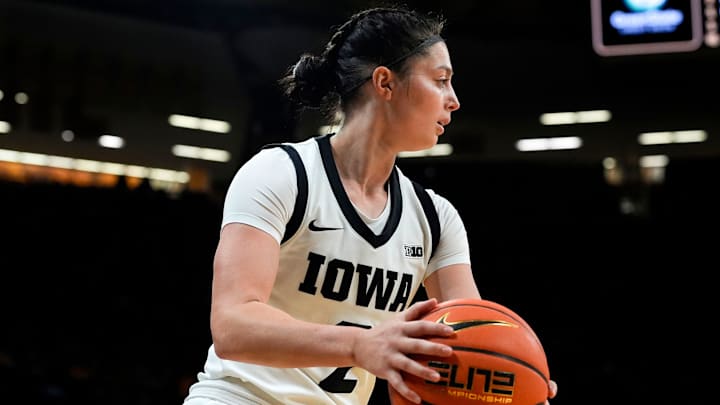 Iowa guard Taylor McCabe (2) looks to pass the ball against the Western Illinois Leathernecks Nov. 26, 2025 at Carver-Hawkeye Arena in Iowa City, Iowa.