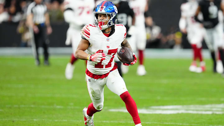 Dec 28, 2025; Paradise, Nevada, USA; New York Giants wide receiver Wan'Dale Robinson (17) runs with the ball after a catch in the second quarter against the Las Vegas Raiders at Allegiant Stadium. Mandatory Credit: Stephen R. Sylvanie-Imagn Images