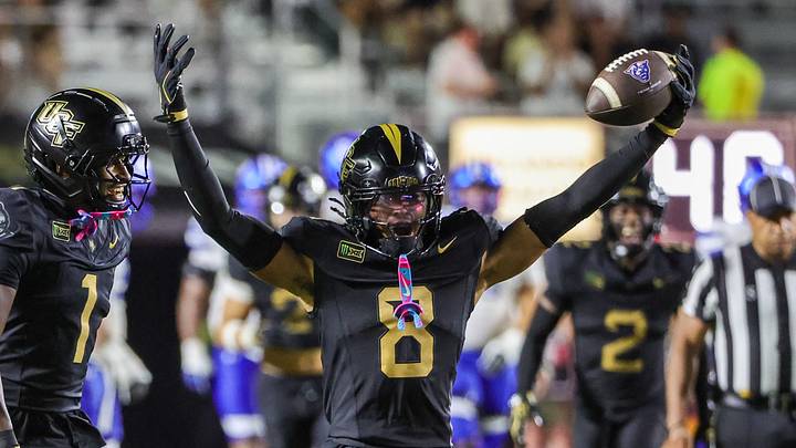 Sep 19, 2026; Orlando, Florida, USA; UCF Knights defensive back Demari Henderson (8) intercepts a pass during the second half against the Georgia State Panthers at Acrisure Bounce House. Mandatory Credit: Mike Watters-Imagn Images Sep 19, 2026; Orlando, Florida, USA; UCF Knights defensive back Demari Henderson (8) intercepts a pass during the second half against the Georgia State Panthers at Acrisure Bounce House. Mandatory Credit: Mike Watters-Imagn Images