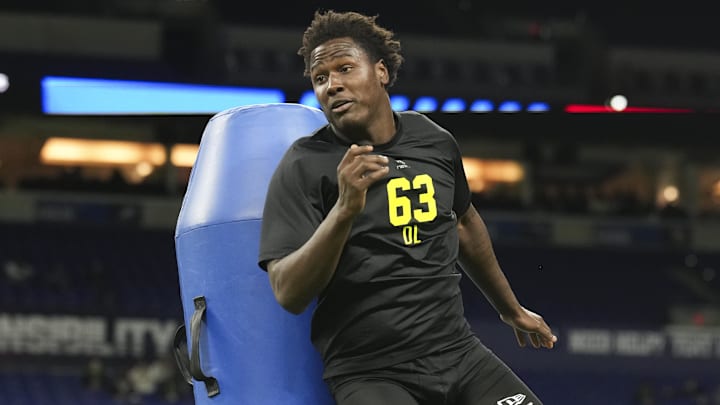 Missouri defensive end Zion Young  goes through defensive line drills at the combine.
