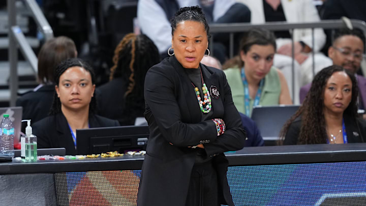 Apr 3, 2026; Phoenix, AZ, USA; South Carolina Gamecocks head coach Dawn Staley looks on in the second half against the UConn Huskies during a semifinal of the Final Four of the women's 2026 NCAA Tournament at Mortgage Matchup Center. Mandatory Credit: Joe Camporeale-Imagn Images Apr 3, 2026; Phoenix, AZ, USA; South Carolina Gamecocks head coach Dawn Staley looks on in the second half against the UConn Huskies during a semifinal of the Final Four of the women's 2026 NCAA Tournament at Mortgage Matchup Center. Mandatory Credit: Joe Camporeale-Imagn Images