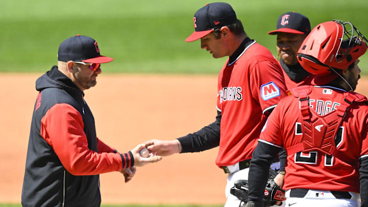 Apr 7, 2026: Cleveland Guardians manager Stephen Vogt (12) takes the ball from starting pitcher Gavin Williams (32) during a pitching change in the sixth inning against the Kansas City Royals at Progressive Field. 
