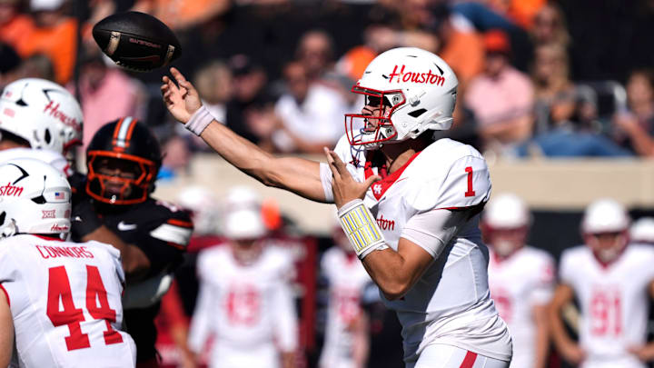 Houston Cougars quarterback Conner Weigman (1) throws a pass during a college football game between the Oklahoma State Cowboys (OSU) and the Houston Cougars at Boone Pickens Stadium in Stillwater, Okla., Saturday, Oct. 11, 2025. Houston Cougars quarterback Conner Weigman (1) throws a pass during a college football game between the Oklahoma State Cowboys (OSU) and the Houston Cougars at Boone Pickens Stadium in Stillwater, Okla., Saturday, Oct. 11, 2025.