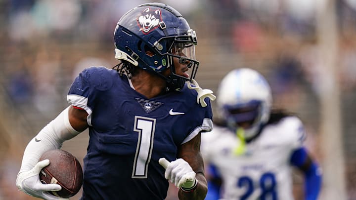 Sep 28, 2024; East Hartford, Connecticut, USA; Connecticut Huskies wide receiver Skyler Bell (1) makes the touchdown catch against the Buffalo Bulls in the second quarter at Rentschler Field at Pratt & Whitney Stadium. Mandatory Credit: David Butler II-Imagn Images Sep 28, 2024; East Hartford, Connecticut, USA; Connecticut Huskies wide receiver Skyler Bell (1) makes the touchdown catch against the Buffalo Bulls in the second quarter at Rentschler Field at Pratt & Whitney Stadium. Mandatory Credit: David Butler II-Imagn Images