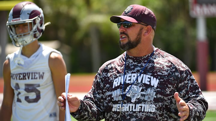 Riverview High head coach Josh Smithers puts his athletes through drills on Monday.  Fall football practice resumed on Monday, Aug. 2, 2021.

Riverview Football Practice 001