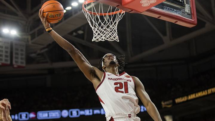 Arkansas Razorbacks forward Cooper Bowser (21) goes up for a layup during the first half against the Gonzaga Bulldogs at Bud Walton Arena.