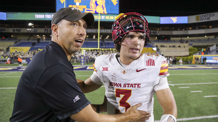 Iowa State Cyclones head coach Matt Campbell celebrates with quarterback Rocco Becht after defeating the West Virginia Mountaineers at Mountaineer Field at Milan Puskar Stadium. 