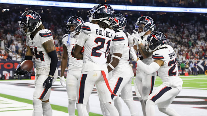 Sep 15, 2024; Houston, Texas, USA;  Houston Texans cornerback Derek Stingley Jr. (24) celebrates his interception against the Chicago Bears in the second half  at NRG Stadium. Mandatory Credit: Thomas Shea-Imagn Images