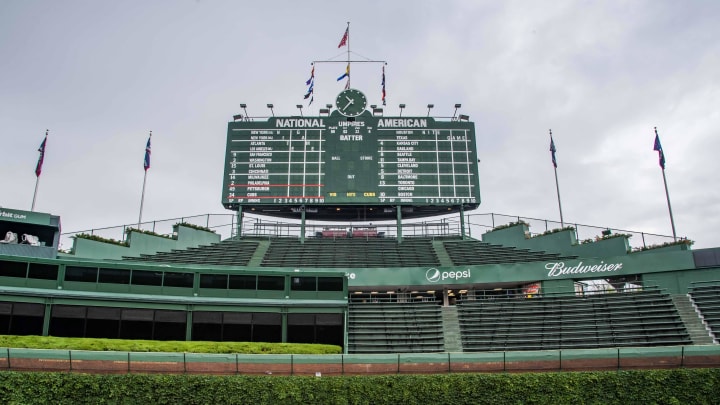 Jun 9, 2018; Chicago, IL, USA; The ivy covered brick outfield wall with the scoreboard is seen prior to a game between the Chicago Cubs and the Pittsburgh Pirates at Wrigley Field. Jun 9, 2018; Chicago, IL, USA; The ivy covered brick outfield wall with the scoreboard is seen prior to a game between the Chicago Cubs and the Pittsburgh Pirates at Wrigley Field.
