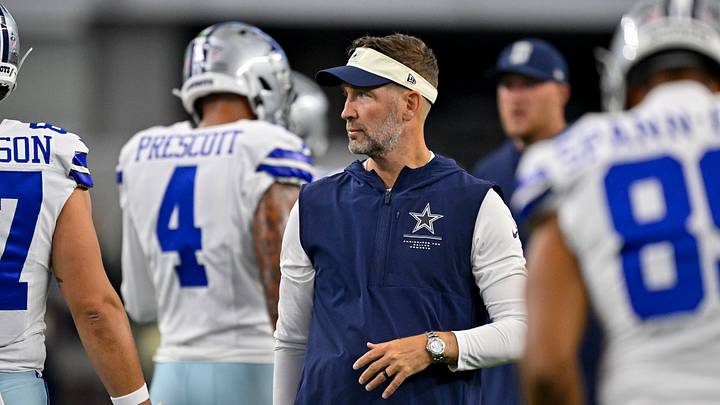 Dallas Cowboys head coach Brian Schottenheimer looks on before the game against the Saints at AT&T Stadium. Dallas Cowboys head coach Brian Schottenheimer looks on before the game against the Saints at AT&T Stadium.