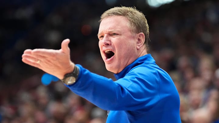 Dec 22, 2024; Lawrence, Kansas, USA; Kansas Jayhawks head coach Bill Self reacts to play against the Brown Bears during the second half at Allen Fieldhouse. Mandatory Credit: Denny Medley-Imagn Images Dec 22, 2024; Lawrence, Kansas, USA; Kansas Jayhawks head coach Bill Self reacts to play against the Brown Bears during the second half at Allen Fieldhouse. Mandatory Credit: Denny Medley-Imagn Images