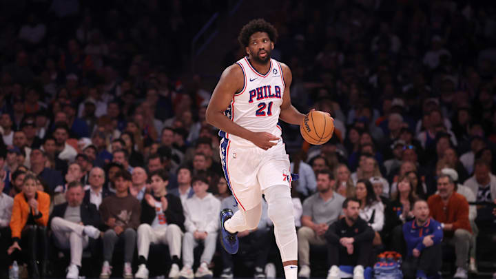 Apr 30, 2024; New York, New York, USA; Philadelphia 76ers center Joel Embiid (21) brings the ball up court against the New York Knicks during the first quarter of game 5 of the first round of the 2024 NBA playoffs at Madison Square Garden. Mandatory Credit: Brad Penner-Imagn Images