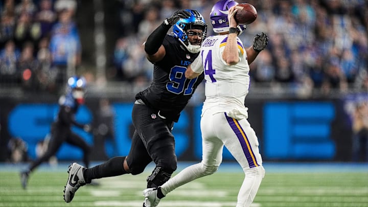 Detroit Lions defensive end Levi Onwuzurike (91) pressures Minnesota Vikings quarterback Sam Darnold (14) Detroit Lions defensive end Levi Onwuzurike (91) pressures Minnesota Vikings quarterback Sam Darnold (14)