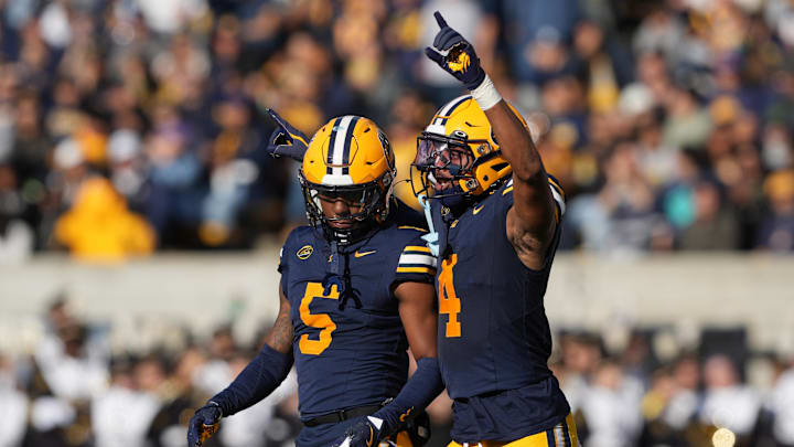 Nov 23, 2024; Berkeley, California, USA; California Golden Bears defensive back Miles Williams (4) reacts with defensive back Marcus Harris (5) after a Stanford Cardinal missed field goal during the second quarter at California Memorial Stadium.