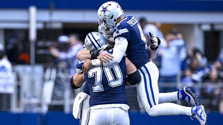 Oct 30, 2022; Arlington, Texas, USA; Dallas Cowboys quarterback Dak Prescott (4) and guard Zack