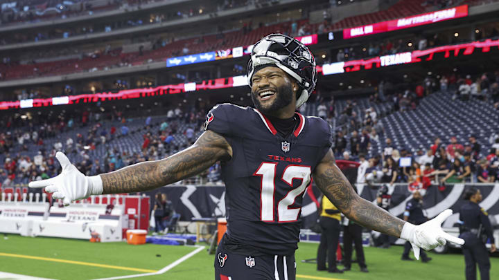 Dec 15, 2024; Houston, Texas, USA; Houston Texans wide receiver Nico Collins (12) smiles after the game against the Miami Dolphins at NRG Stadium. Mandatory Credit: Troy Taormina-Imagn Images