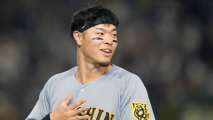 Mar 15, 2025; Bunkyo, Tokyo, Japan; Hanshin Tigers right fielder Teruaki Sato (8) during the fifth inning against the Chicago Cubs at Tokyo Dome. Mandatory Credit: Darren Yamashita-Imagn Images Mar 15, 2025; Bunkyo, Tokyo, Japan; Hanshin Tigers right fielder Teruaki Sato (8) during the fifth inning against the Chicago Cubs at Tokyo Dome. Mandatory Credit: Darren Yamashita-Imagn Images