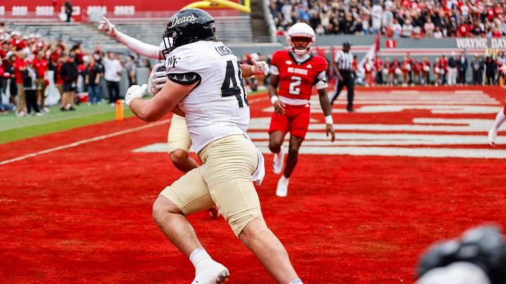 Oct 10, 2026; Raleigh, North Carolina, USA; Wake Forest Demon Deacons tight end Matthew Lusardi (48) catches the football for a touchdown during the first half of the game against NC State Wolfpack at Carter-Finley Stadium. Mandatory Credit: Jaylynn Nash-Imagn Images Oct 10, 2026; Raleigh, North Carolina, USA; Wake Forest Demon Deacons tight end Matthew Lusardi (48) catches the football for a touchdown during the first half of the game against NC State Wolfpack at Carter-Finley Stadium. Mandatory Credit: Jaylynn Nash-Imagn Images