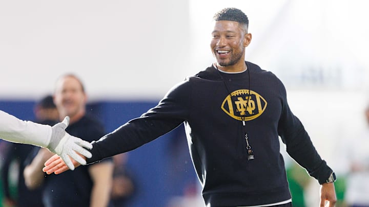 Notre Dame head coach Marcus Freeman greets his players during a Notre Dame football spring practice at Irish Athletic Center on Wednesday, March 19, 2025, in South Bend.