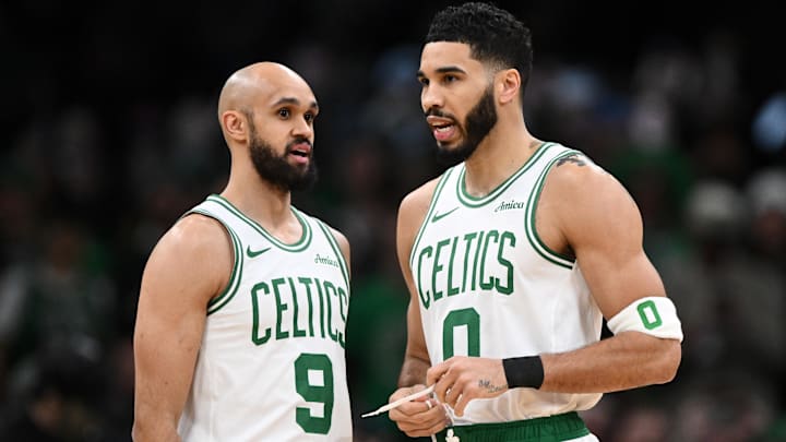 Feb 12, 2025; Boston, Massachusetts, USA; Boston Celtics guard Derrick White (9) and forward Jayson Tatum (0) talk before a game against the San Antonio Spurs at the TD Garden. Mandatory Credit: Brian Fluharty-Imagn Images