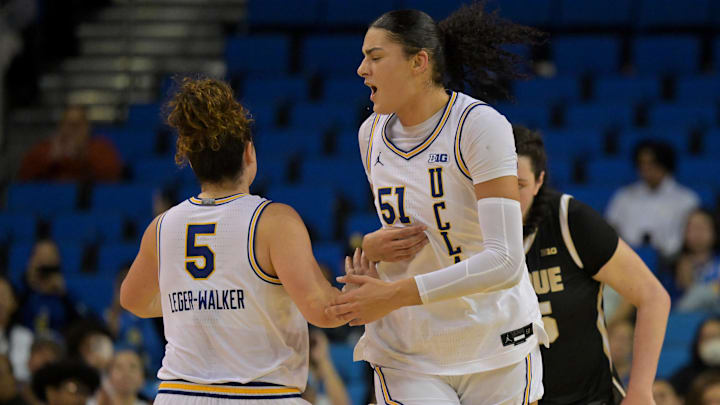 Jan 21, 2026; Los Angeles, California, USA;  UCLA Bruins center Lauren Betts (51) congratulates guard Charlisse Leger-Walker (5) after a 3-point basket in the second half against the Purdue Boilermakers at Pauley Pavilion presented by Wescom Financial. Mandatory Credit: Jayne Kamin-Oncea-Imagn Images