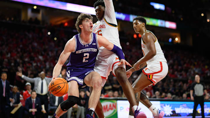 Mar 8, 2025; College Park, Maryland, USA; Northwestern Wildcats forward Nick Martinelli (2) handles the ball during the first half against Maryland Terrapins center Derik Queen (25) at Xfinity Center. Mandatory Credit: Reggie Hildred-Imagn Images